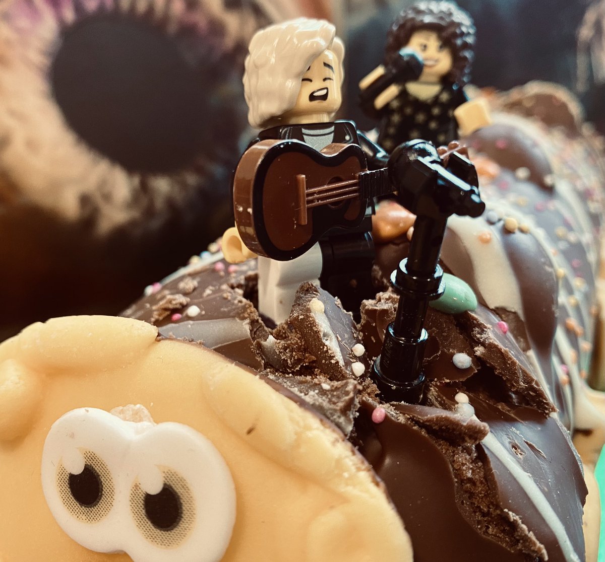 OperationSpark2's tweet photo. Arcade Fire album release day traditionally calls for Arcade Fire cake (in this house anyway). 

Sadly this album release has hit at a busy time for us so the effort is somewhat half arsed. Can’t beat a caterpillar cake though (Lego Win and Régine like it too).

Happy WE day!!!! https://t.co/1rFkdm7mky