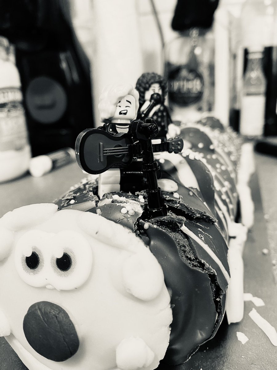 OperationSpark2's tweet photo. Arcade Fire album release day traditionally calls for Arcade Fire cake (in this house anyway). 

Sadly this album release has hit at a busy time for us so the effort is somewhat half arsed. Can’t beat a caterpillar cake though (Lego Win and Régine like it too).

Happy WE day!!!! https://t.co/1rFkdm7mky