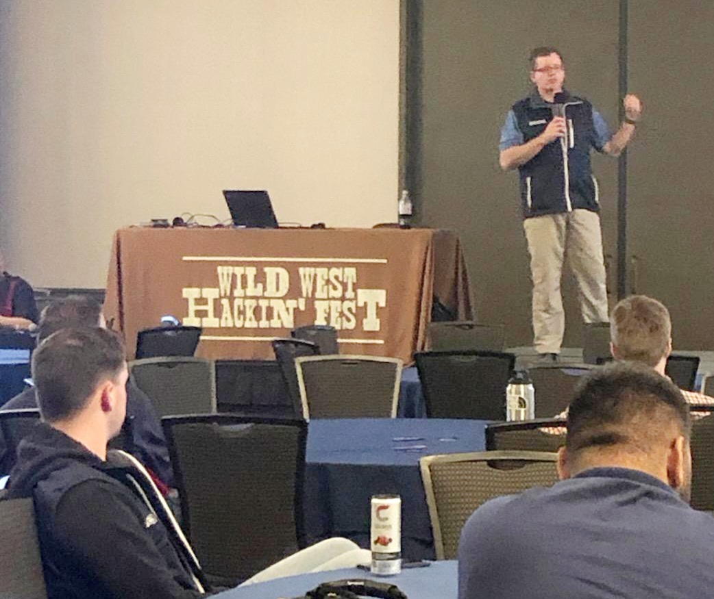 IANS Faculty member Jake Williams presenting on the topic of ransomware resilience to attendees of Wild West Hackin' Fest.