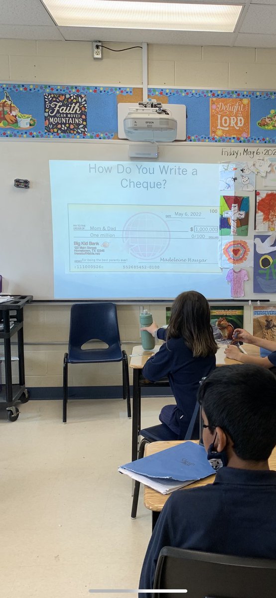 misshauzar's tweet photo. For #FunFriday today we played the price is right to introduce reasonably priced items! I was pleasantly surprised that my grade 4s were familiar with the show 😂 we also learned how to fill out a cheque! #chequeitout https://t.co/bdaIoCFCTA