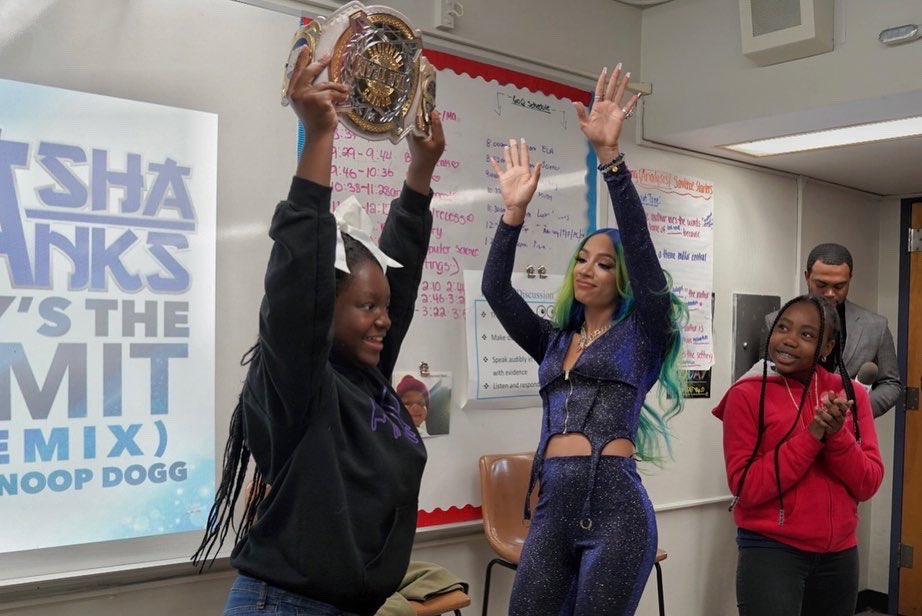 WWE's tweet photo. School was in session with The Boss at KIPP AMP Middle School in Brooklyn ahead of #SmackDown!

@SashaBanksWWE https://t.co/Qj0ZjGGJXI