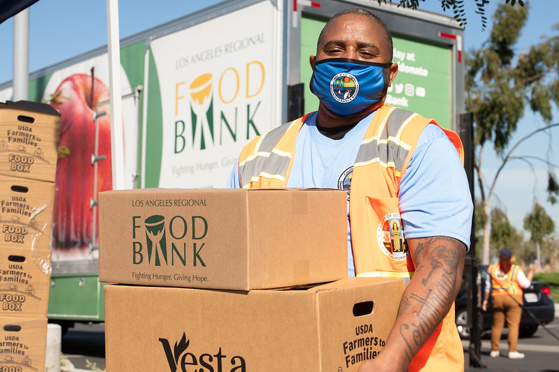 CountyofLA's tweet photo. Good news! LA County is resuming free weekly food distribution events for families through the end of the year. During the pandemic, we’ve distributed ~15 million pounds of food to families in need. The first giveaway is slated for May 18 in El Monte. Stay tuned for more details. https://t.co/vaxE7yI7l7