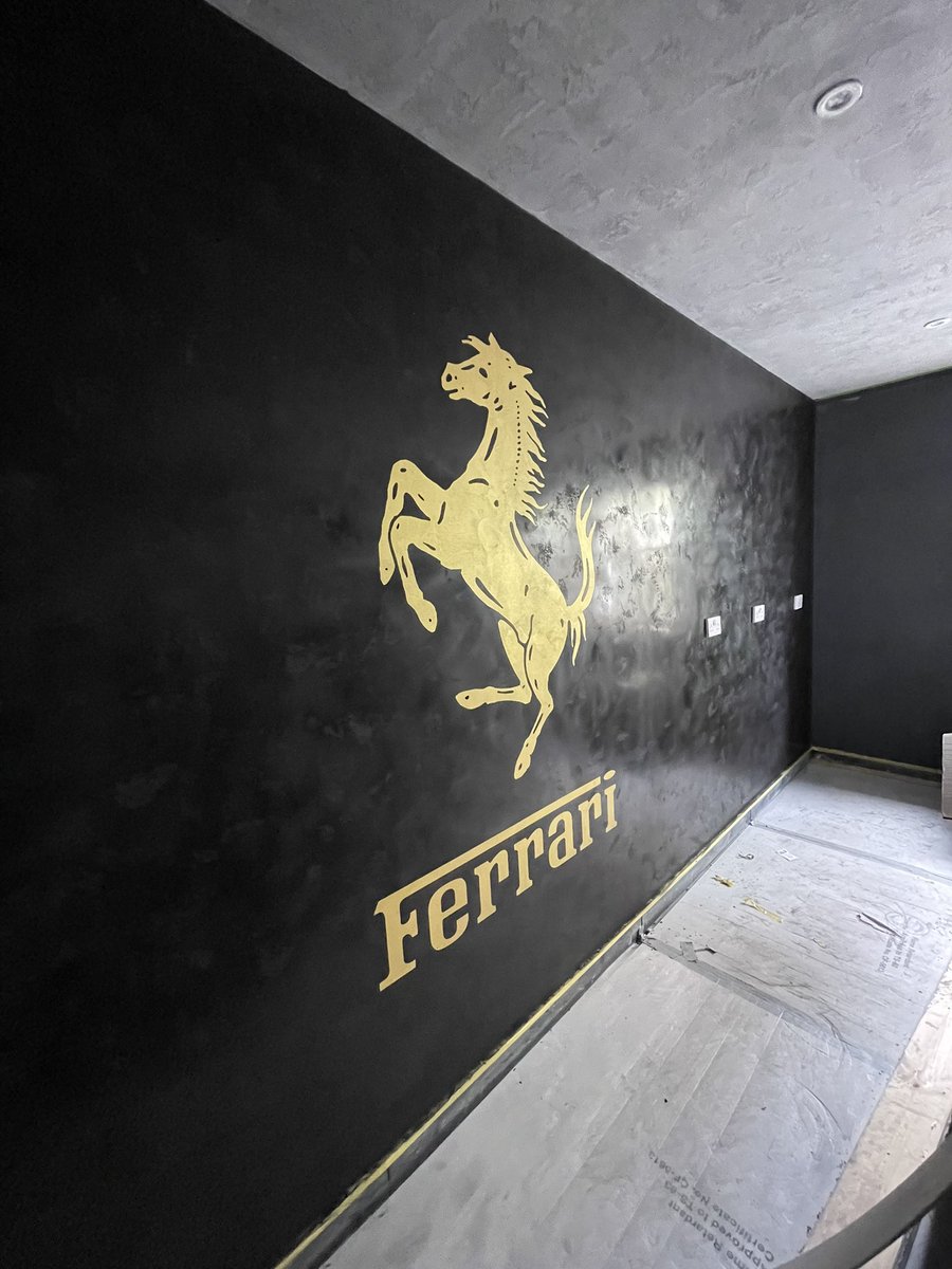 raffinatovenet1's tweet photo. Few more days left on this garage  project but Logo Ferrari feature wall added today 👌🏻 https://t.co/PhePCXbDH2