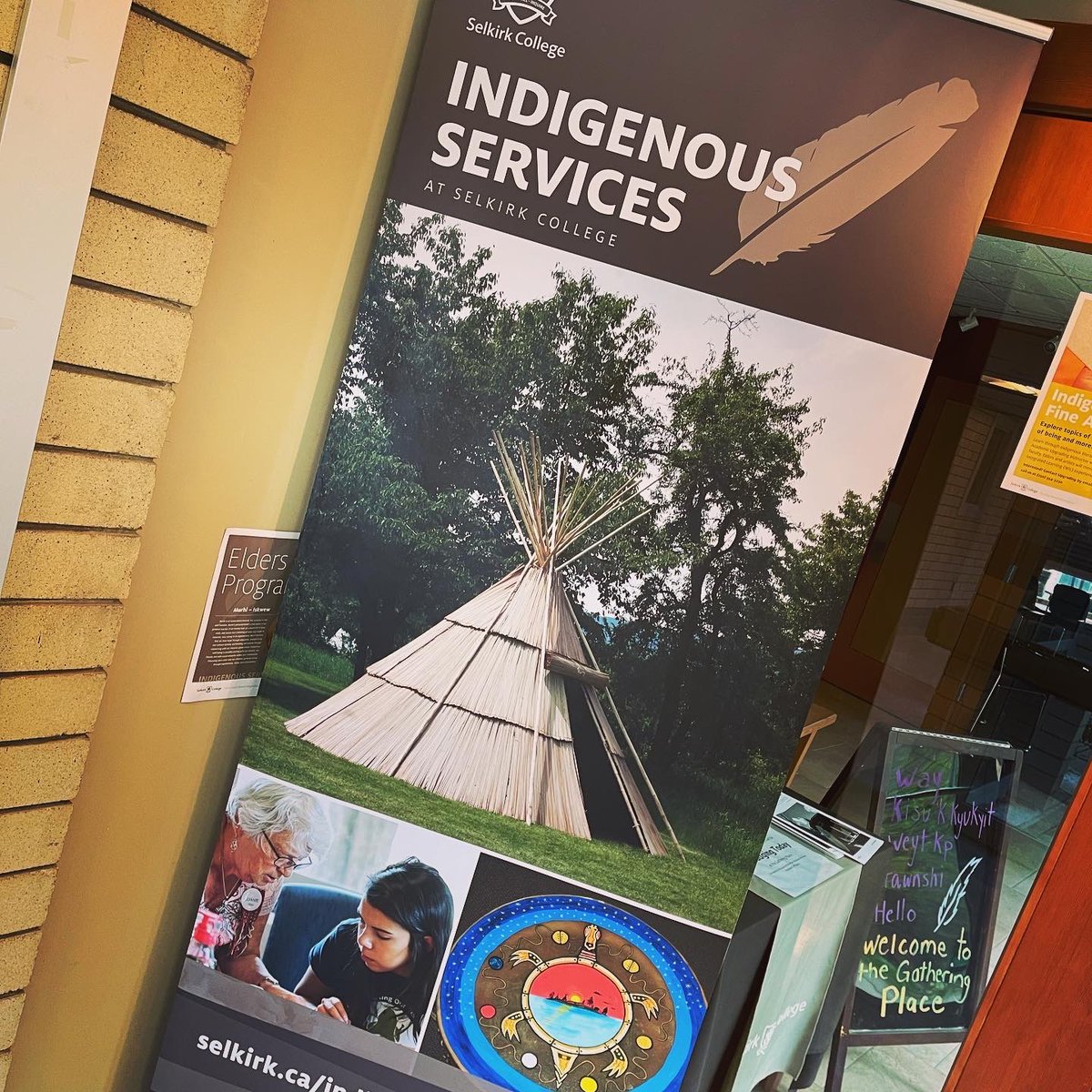 Cmtus_Sturgeon's tweet photo. Visited Selkirk College yesterday in Castlegar, British Columbia at confluence of Kootenay &amp; Columbia River. Neat to see my 2012 #tulemattipi display with door mat for elder and disability access still featured on poster! #tulemat #tulematlodge #tulemathouse https://t.co/5YBiSNoU0W