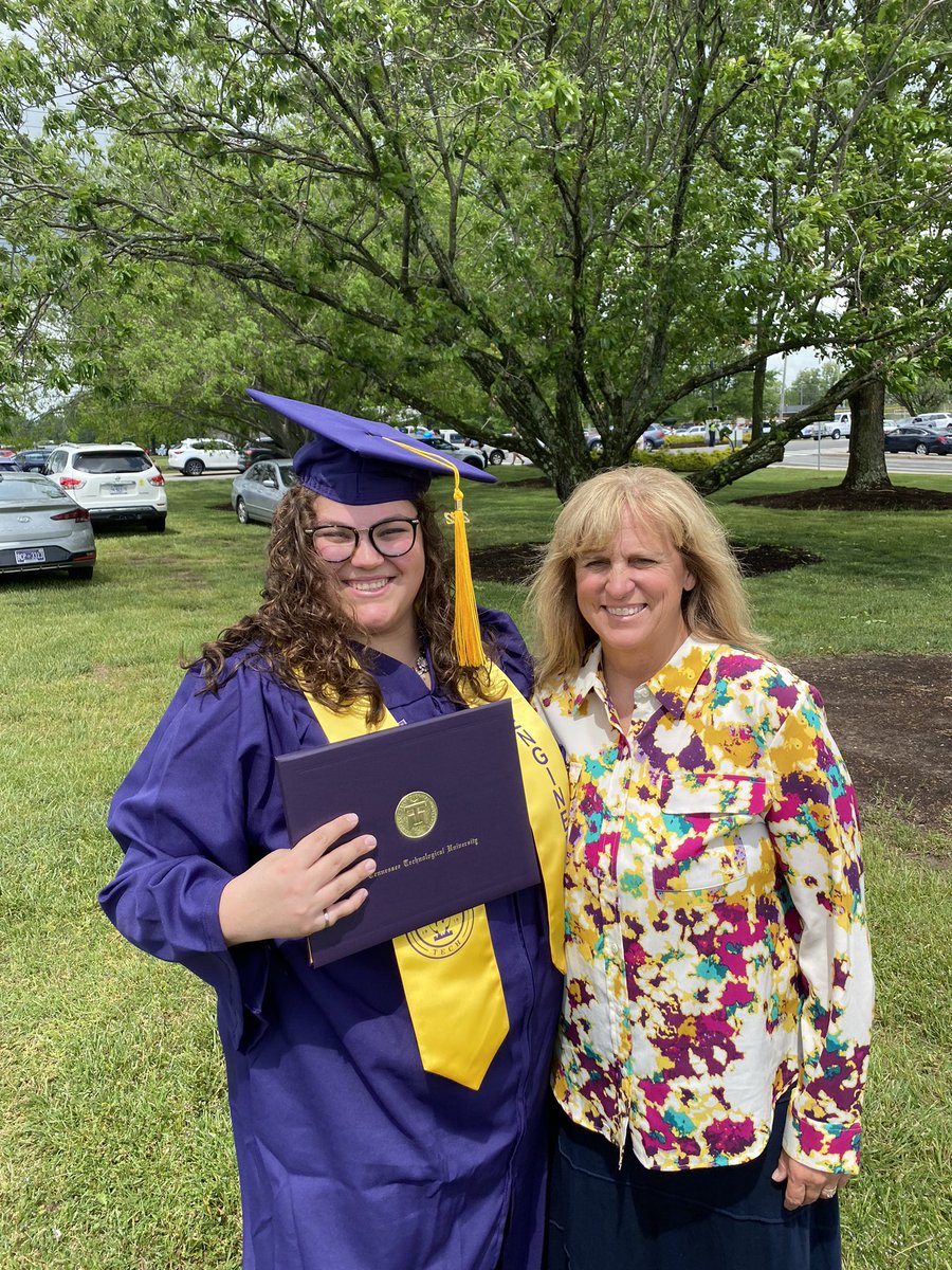 czmitchell's tweet photo. We are so blessed to have 2 graduates in 6 months. Time for you to “soar on wings like eagles.” #wingsup #TalonsUp https://t.co/gaqgzhGizT