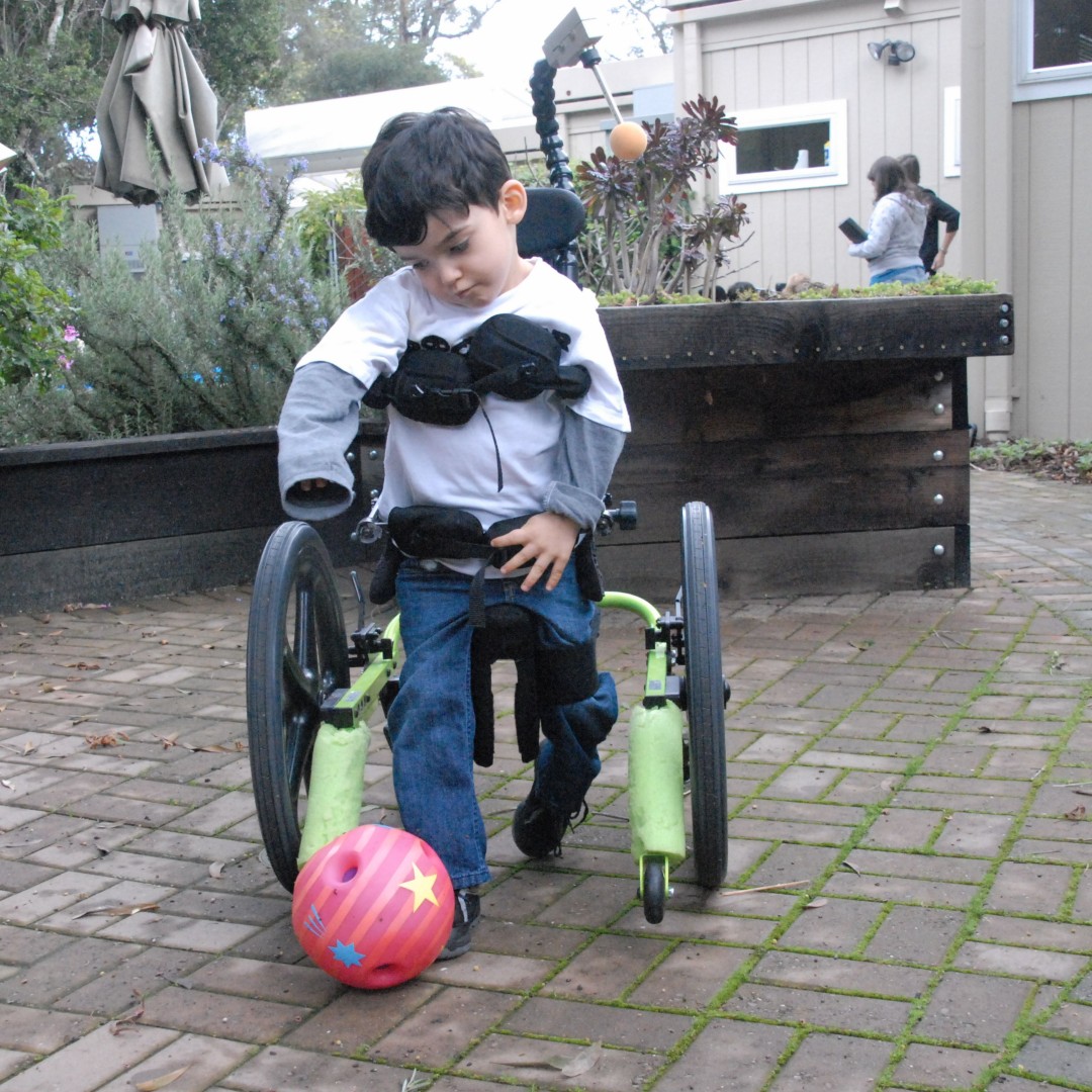 Hands-free walkers allow our kids to experience self-directed mobility.  This gives them freedom to explore their environment.  Kids need these moments to create, feel the ground under their feet, kick a ball!  Give the gift of first steps and donate. bridgeschool.org/firststeps/