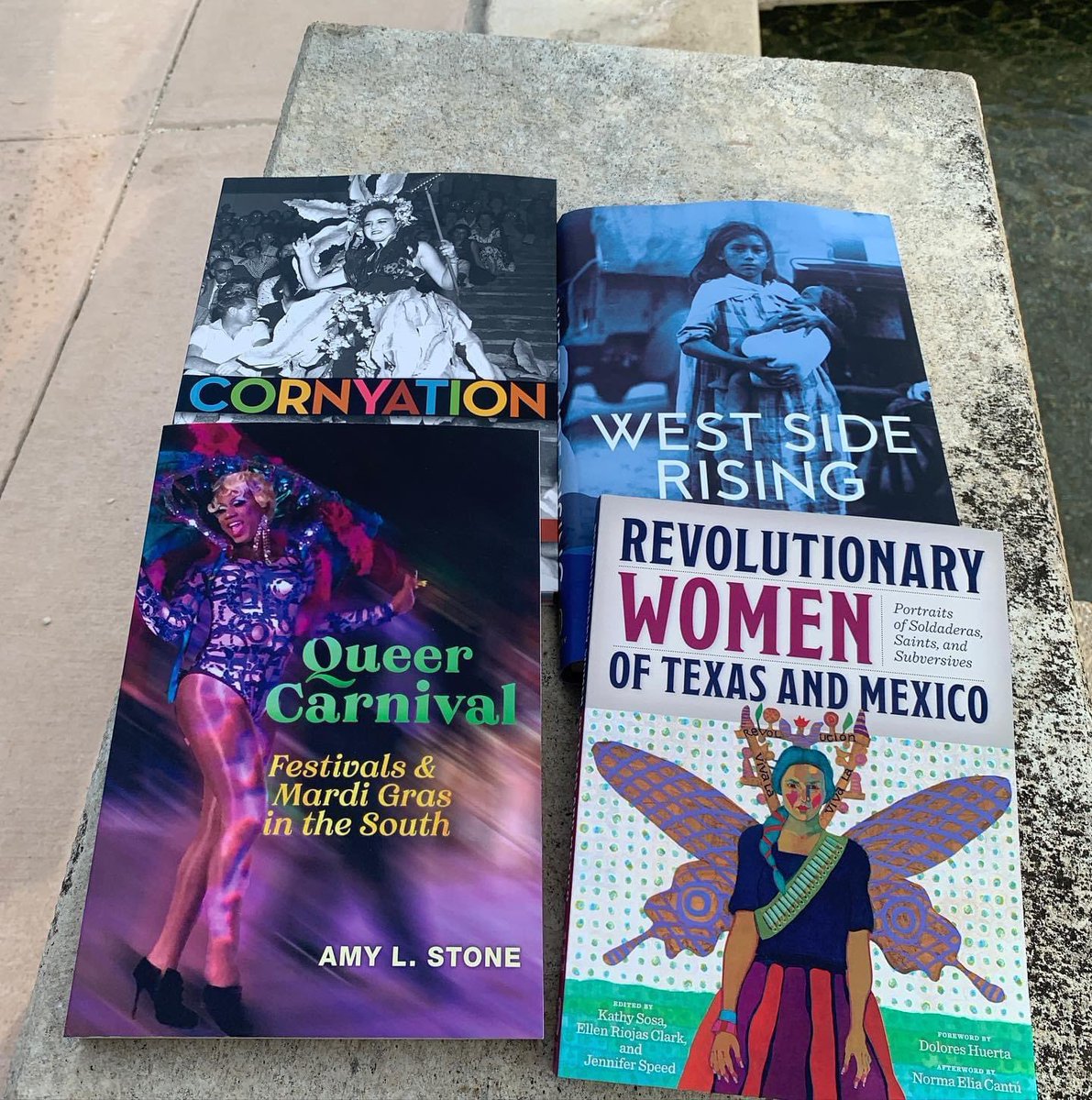 CheriseRohr's tweet photo. Excited toget a signed copy of @AmyLStone1’s new book @queer_carnival and extra copies of #Cornyation for me and for @SanAntonioAIDS ! + two awesome books. Can’t wait to get the gang back together! @colorsofpridesa @Trinity_U https://t.co/INy6FRgdWM