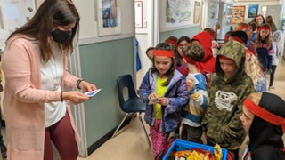 SD62_Sooke's tweet photo. Those sneaky Kindness Ninjas have struck again. This time, Mme. Belanger's grade 2/3 class at Millstream took to the halls to share tasty treats with unsuspecting staff members.  🥰 https://t.co/1Oc4DFQDw6