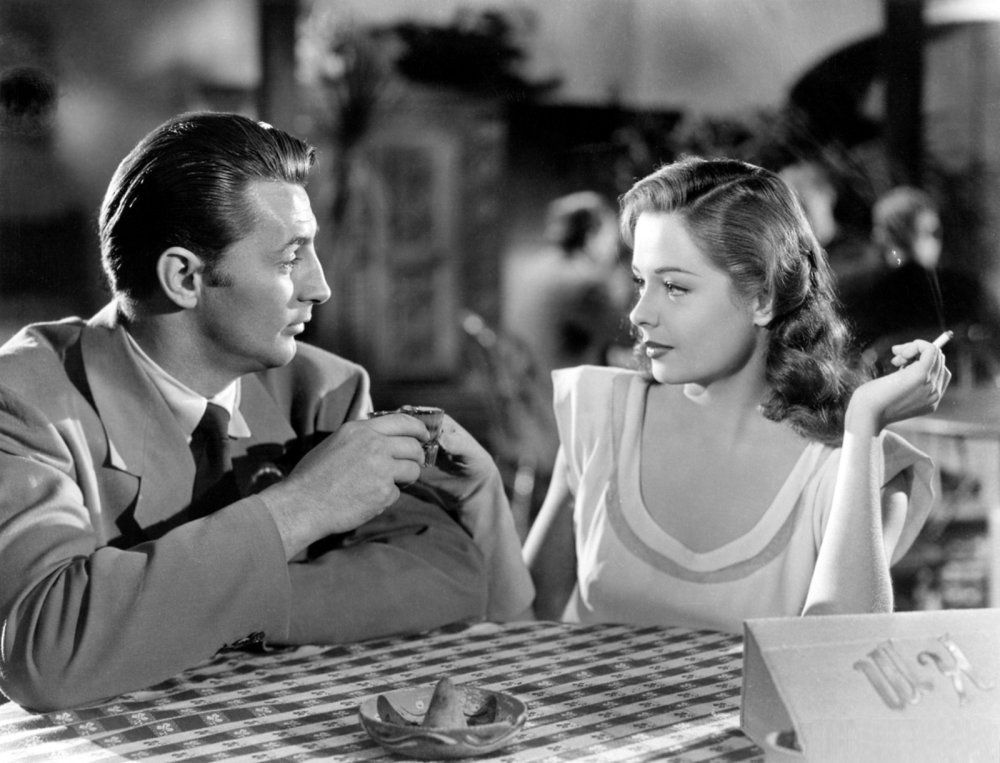 Robert Mitchum and Jane Greer 'Out of the Past'(1947) Lying dames, hard-boiled dialogue, flashback sequences and world-weary voiceovers from Mitchum all find perfection in a movie that defines film noir. #FilmNoir #OldHollywood #RobertMitchum #JaneGreer #1940s