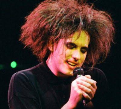 My friend's chicken looks like Robert Smith from <a href="/thecure/">The Cure</a>