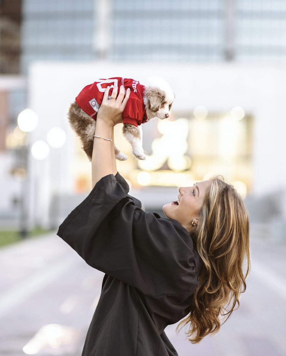 UofAlabama's tweet photo. Can we get a round of a-paws for these #BamaGrads + their fur babies? 🥰 https://t.co/dNVuBtocom