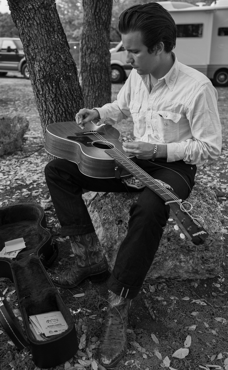 I met Theo Lawrence at Willie Nelson's birthday concert in Luck, TX. 

When I came across the scene at this weekends event in <a href="/LuckReunion/">Luck Reunion</a> I felt like I was watching a young Elvis Presley working on his guitar, quiet and content in his own musical world. 

#LeicaQ2