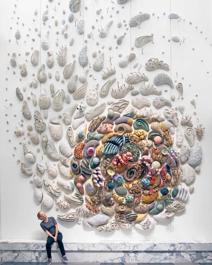 Artist Courtney Mattison creates large scale ceramic sculptural works inspired by the fragile beauty of coral reefs to raise awareness of the blue planet, urging protection of our oceans #WomensArt