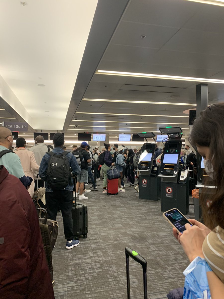 michaelsbloom's tweet photo. @TorontoPearson @GovCanHealth How is this related to covid ? You have a border agent queuing problem and it is potentially a superspreader event. https://t.co/56qhS5bzOR