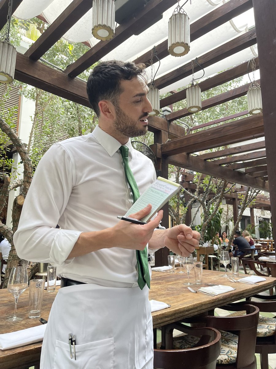 So this was our waiter tonight who was Lewis Hamilton’s waiter last night. He told him he was rooting for #Ferrari!