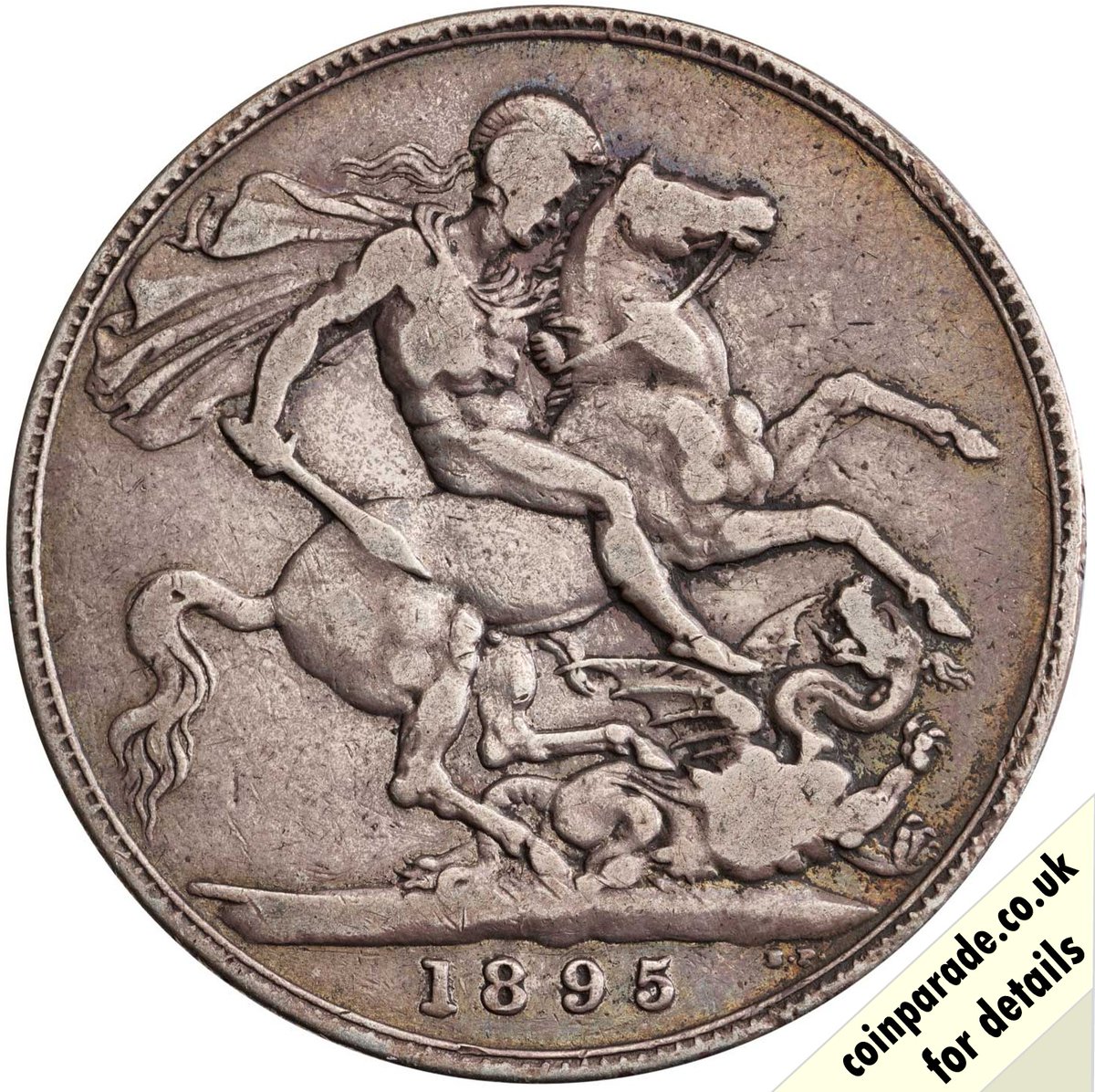 The 1895 Crown - Victoria: Silver (.925) Crown of Queen Victoria. The Reverse shows St George and the Dragon by Benedetto Pistrucci. Edge inscribed with the Regnal date and can be "ANNO REGNI LVIII" or "ANNO REGNI LIX". Read more at bit.ly/3ypbgxJ