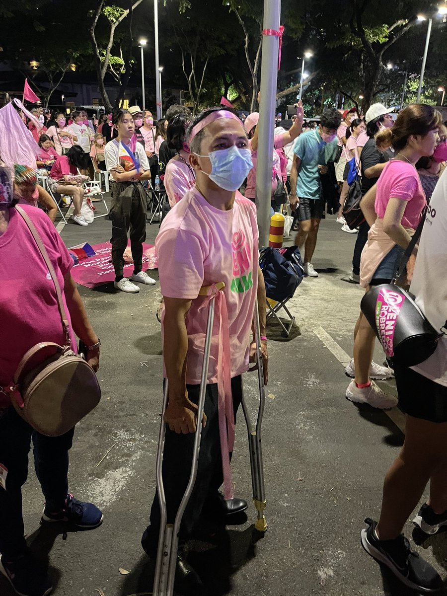 anthesguerra's tweet image. Rene, 53, is a martial law baby. He joined the EDSA People Revolution in his youth. After almost 40 years, he’s back to join the movement blocking the return of the Marcoses. 

“I’m having a hard time,” Rene, standing with crutches, said. “But I have to be here.” #Humans4Leni
