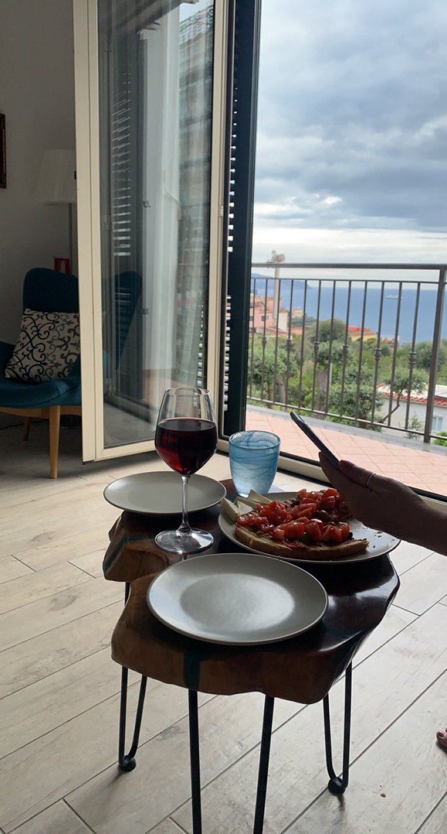 sharkers's tweet photo. Bruschetta overlooking the Bay of Naples 😜 https://t.co/Px6L3Pebhc