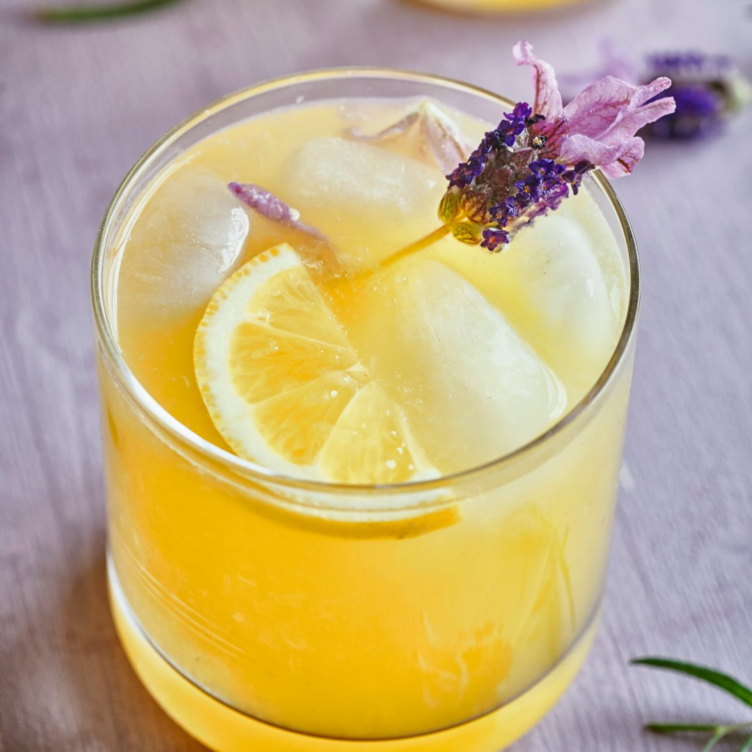 This spring-like fresh and floral cocktail is perfect for Mother’s Day! To make, combine in a shaker: 1 1/2 oz tequila 3/4 oz lemon juice, freshly squeezed 3/4 oz honey syrup 1 egg white 1 dash lavender bitters Dry shake, serve over ice, and enjoy!