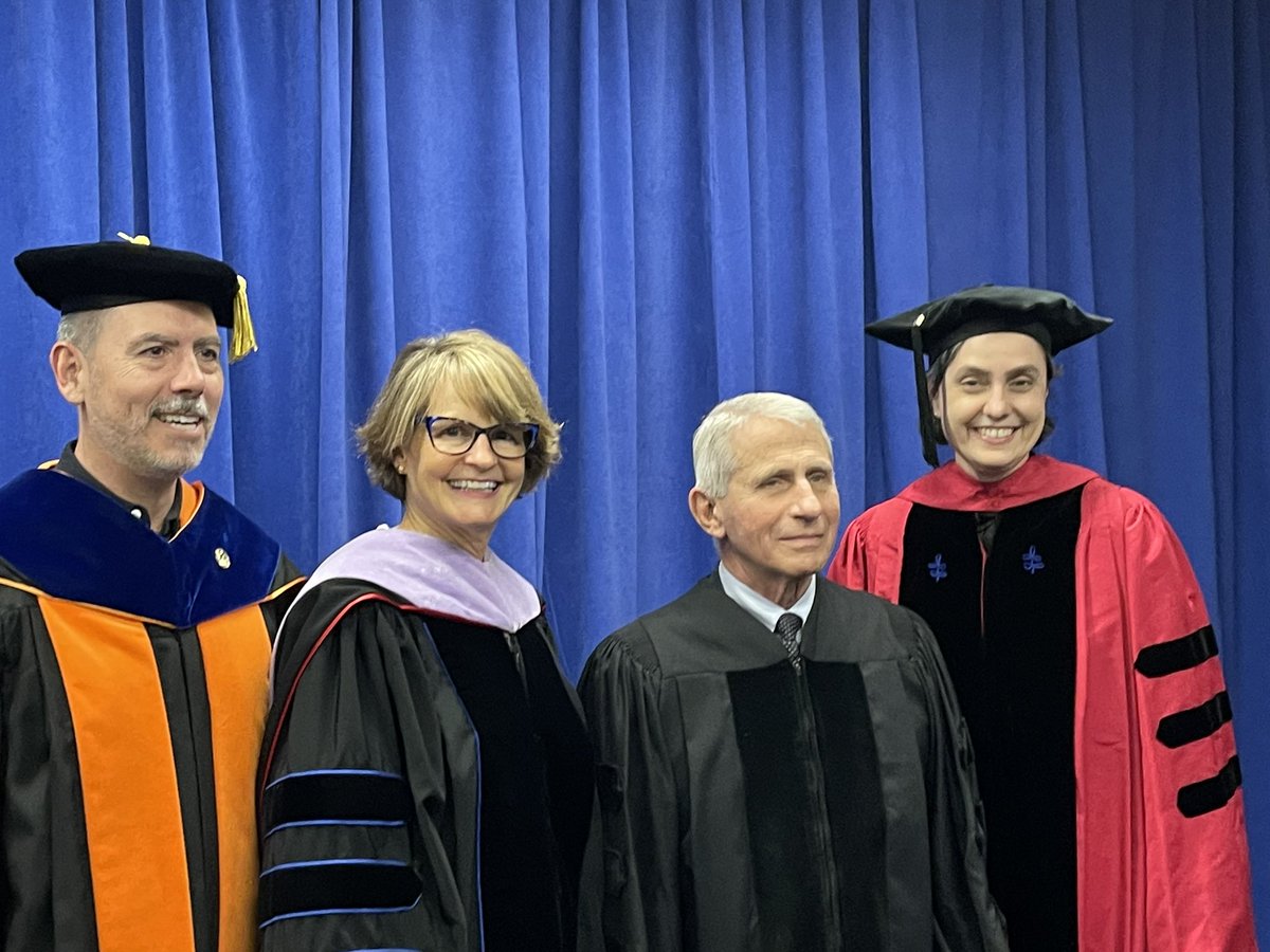 DrAlexDaSilva's tweet photo. My wife, Dr.Theodora Danciu, is part of the @UMich graduation event today representing our school. She is with Dr. Laurie McCauley our @UMichDentistry Dean and next UM provost, and Dr. Anthony Fauci, Chief Medical Advisor to the US president, and a true hero of our modern times. https://t.co/X6Levo2y9n