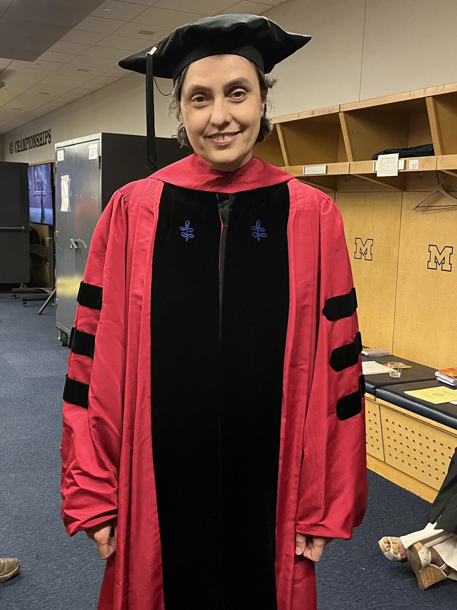 DrAlexDaSilva's tweet photo. My wife, Dr.Theodora Danciu, is part of the @UMich graduation event today representing our school. She is with Dr. Laurie McCauley our @UMichDentistry Dean and next UM provost, and Dr. Anthony Fauci, Chief Medical Advisor to the US president, and a true hero of our modern times. https://t.co/X6Levo2y9n