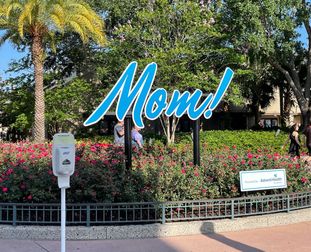 WDWNT's tweet photo. For Mother’s Day, Disney Springs added a giant sign reading “Mom!”

The sign is presented by AdventHealth.

Yes, we now need sponsors for 3 letters and an exclamation point. https://t.co/aH6S3bR7bI