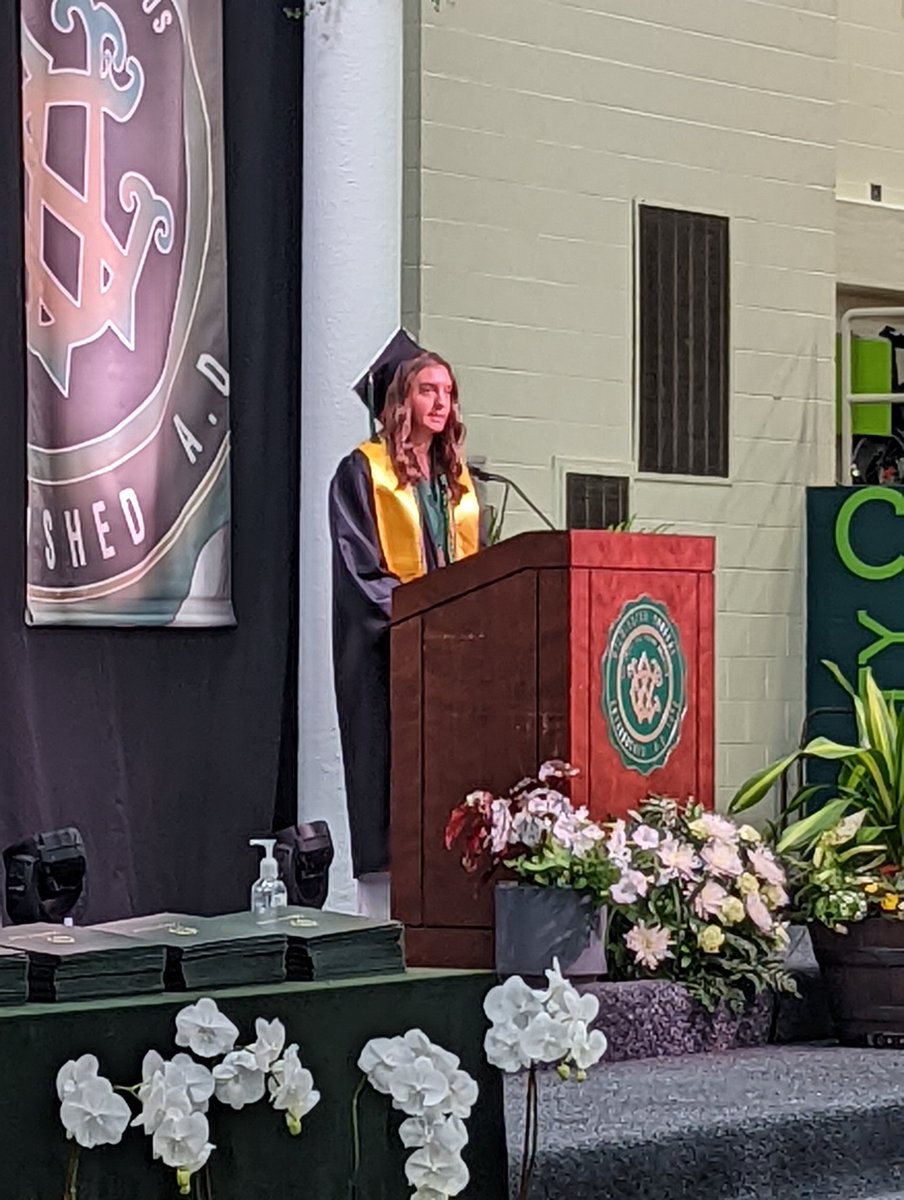 DubCQuakers's tweet photo. Hayley Suchland of @DubC_Softball addressing the candidates for bachelor of science. #WeAreDubC #Classof2022 https://t.co/SmBrBRjGhm