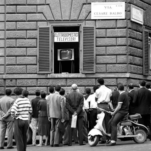 People in front of a TV store watching the Olympics, Italy, 1960.