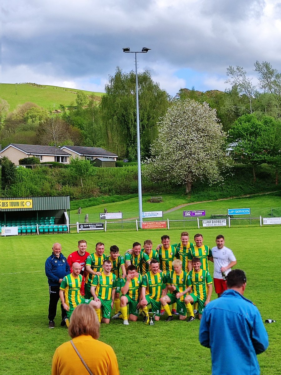 LlaniTownfc's tweet photo. Reserves sign off in style with a 4-1 win and a trophy.  #champions https://t.co/6mPBPi3K1h