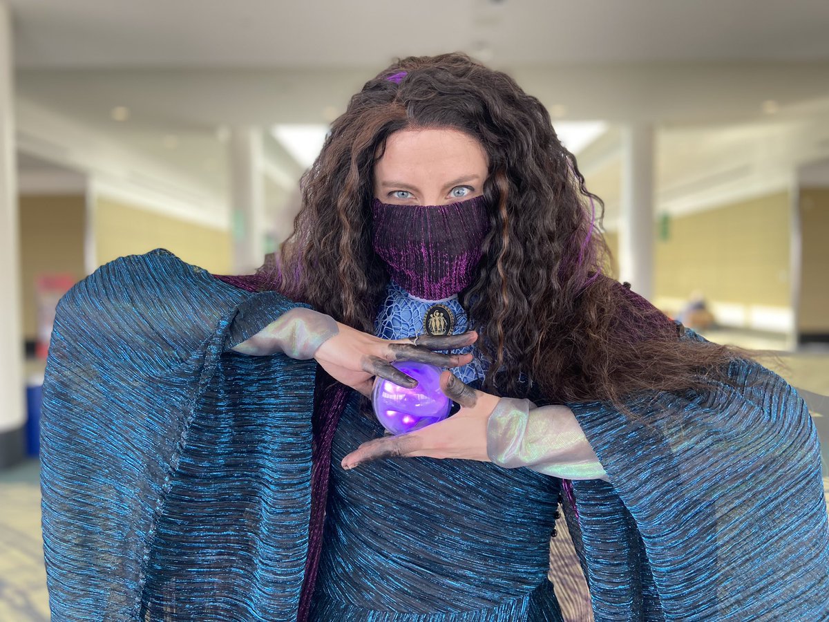 theizzEB's tweet photo. I had a fantastic time at #PAXEast cosplaying as Agatha Harkness from WandaVision! Everyone at the convention was so lovely and seemed really happy to see the character. I even dressed up my mobility device to make it look more like I was actually floating around. #WandaVision https://t.co/XW109XTnzu