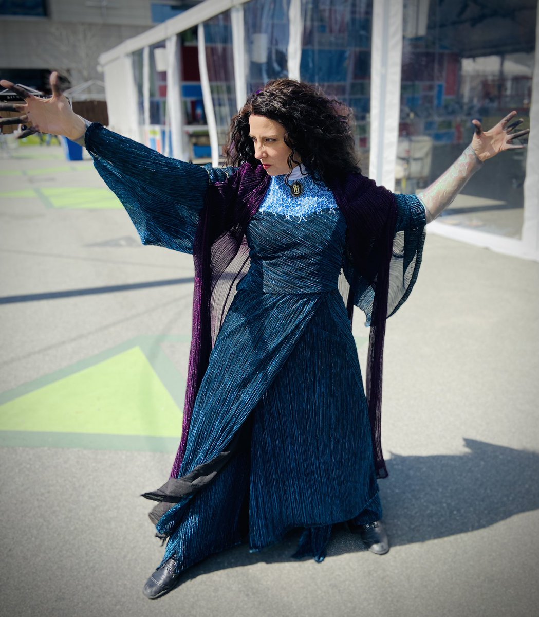 theizzEB's tweet photo. I had a fantastic time at #PAXEast cosplaying as Agatha Harkness from WandaVision! Everyone at the convention was so lovely and seemed really happy to see the character. I even dressed up my mobility device to make it look more like I was actually floating around. #WandaVision https://t.co/XW109XTnzu