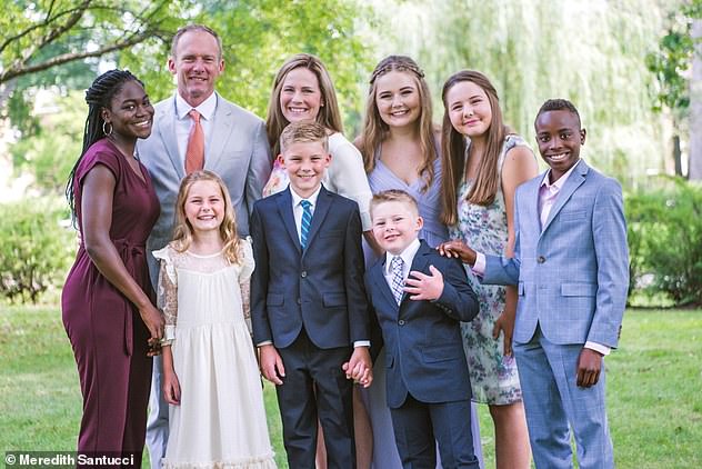 Let's all be thankful and pray for this Mom, Dad, and their seven children. What a beautiful family.