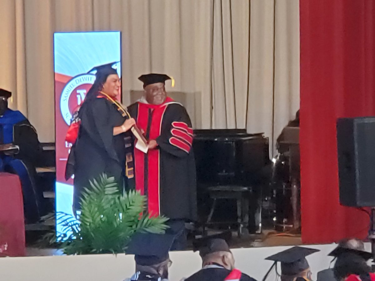 Del. Marcia Price receiving an award on stage at her School of Theology at Virginia Union graduation. 