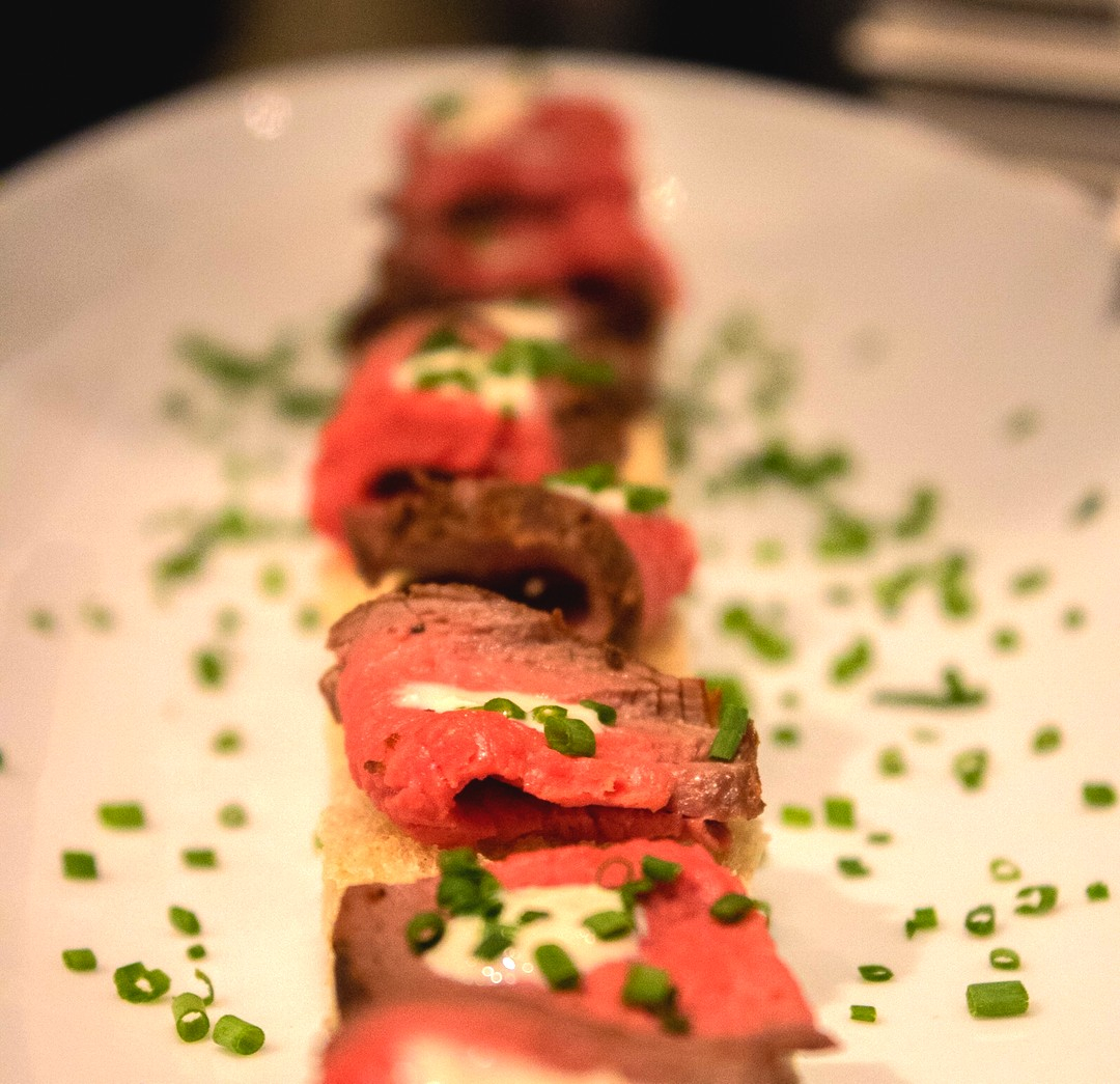 BenedictsAZ's tweet photo. Who says hors d'oeuvres can't be hearty? Beef tenderloin crostini with a glass of red? Yes please! https://t.co/qMocymJkAt