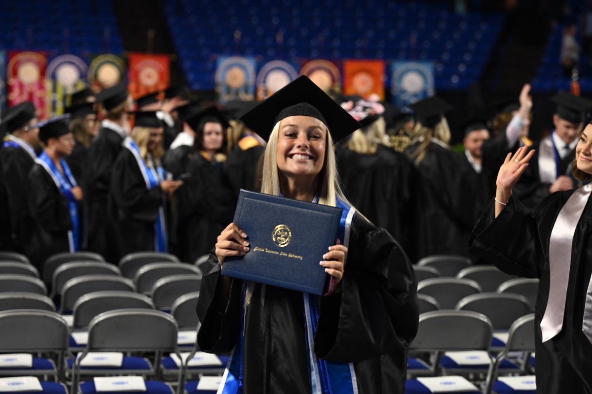 MTSU's tweet photo. Graduation day smiles are our favorite kind of smiles! #trueBLUE #MTSU2022 https://t.co/UpQoKblT3i