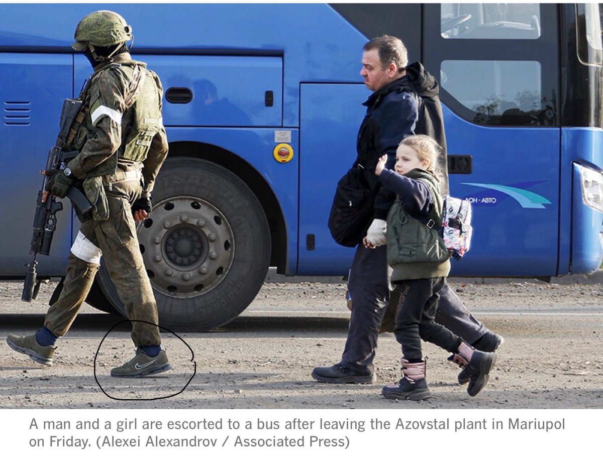 SteveSandersTV's tweet photo. Am I the only one to notice the Russian soldier in this AP photo is wearing Nikes? Is this standard combat footwear for the Russian military? https://t.co/AT3LGahVDm