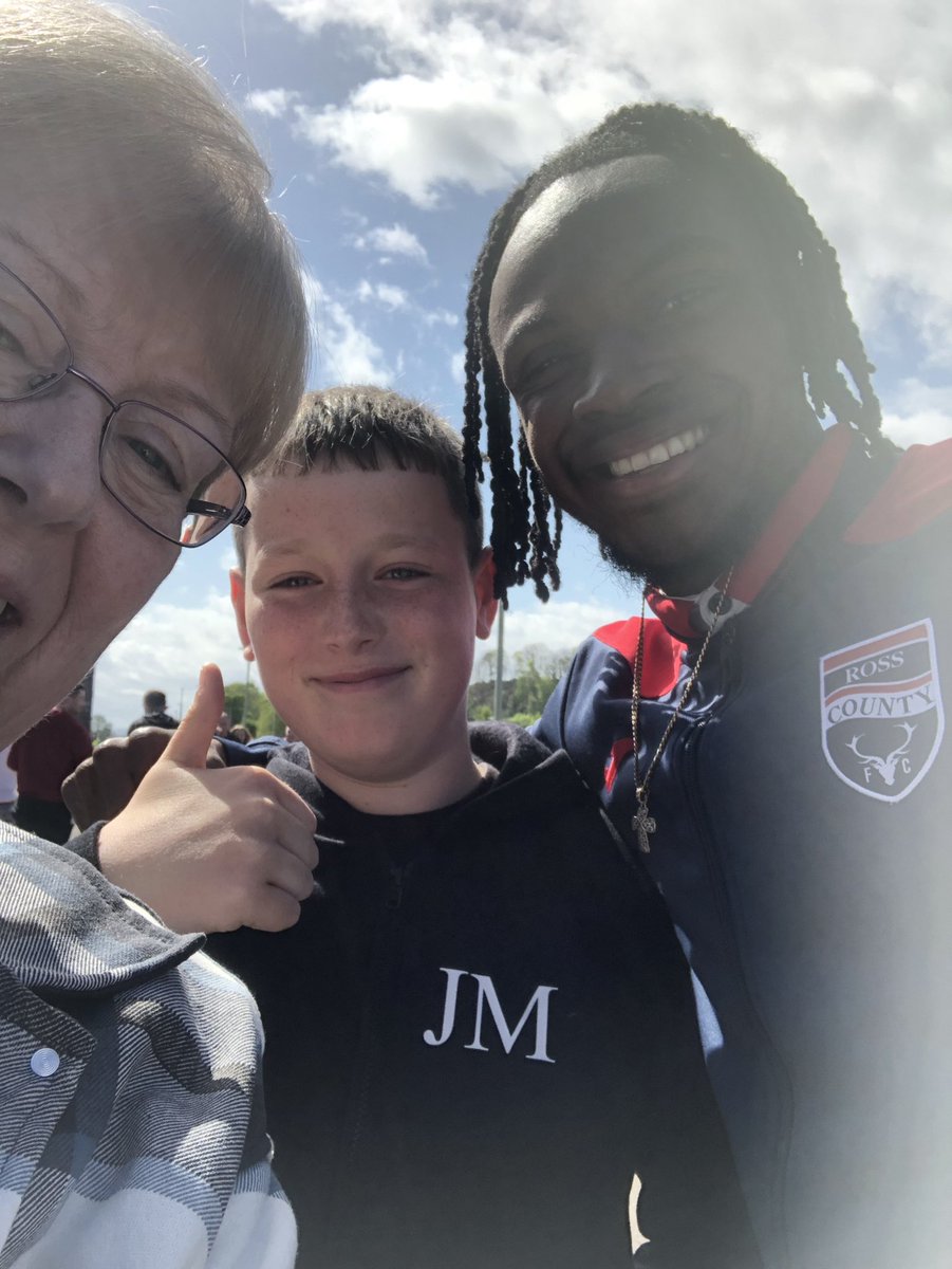 JackNormz's tweet photo. At @RossCounty today in hospitality for hubby’s 65th birthday prezzie and grandson Jake was delighted to get selfie with @R_charlescook  (and granny!). Thanks for taking time for pic, sorry result never went our way  but we had a brilliant day anyway ⚽️ https://t.co/Y7wC4NQ76G