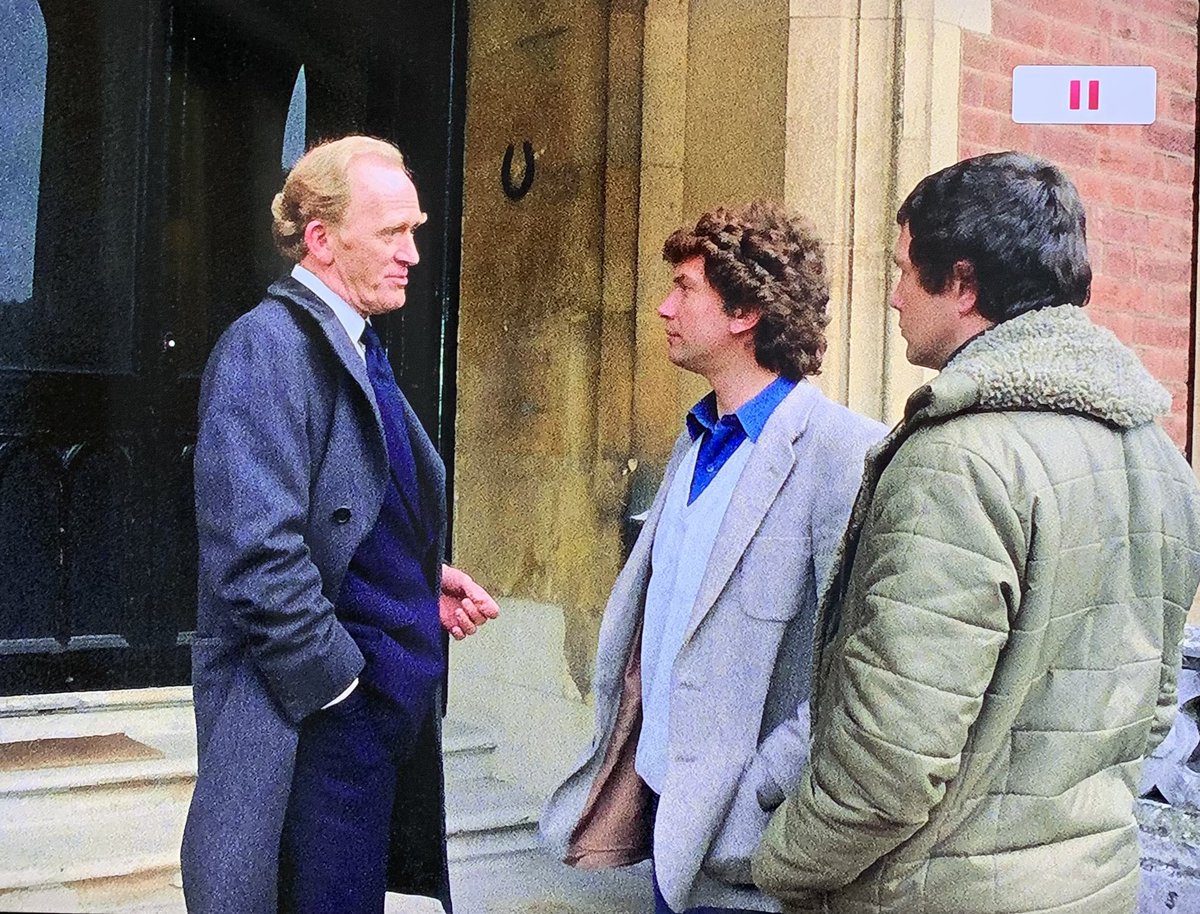 CI5BDC's tweet photo. Ep Ojuka Situation “Then and Now” on location the old Haileybury Junior #School (now #apartments ) #longbourn , off Imperial Rd #windsor Note glass doors have been installed in front of where the lads are stood #theprofessionals https://t.co/x2cbbBPFCg