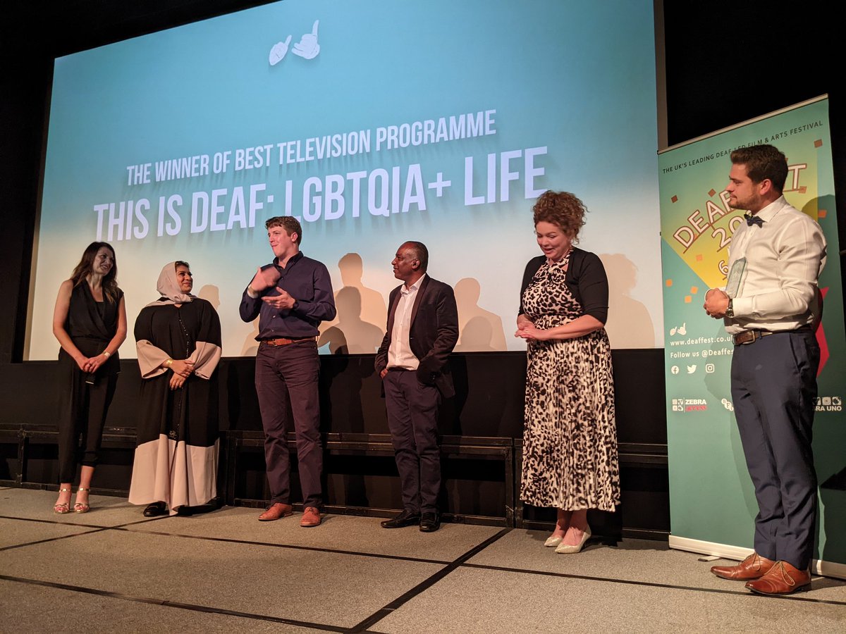 Deaffest's tweet photo. Ashley Kendall, Director of Marketing and Business Development for @SignVideo, has announced that the #Deaffest 2022 Best Television Programme award goes to… ‘This is Deaf: LGBTQIA+ Life’ directed by Giles Bowman! https://t.co/66VPUm4rjd