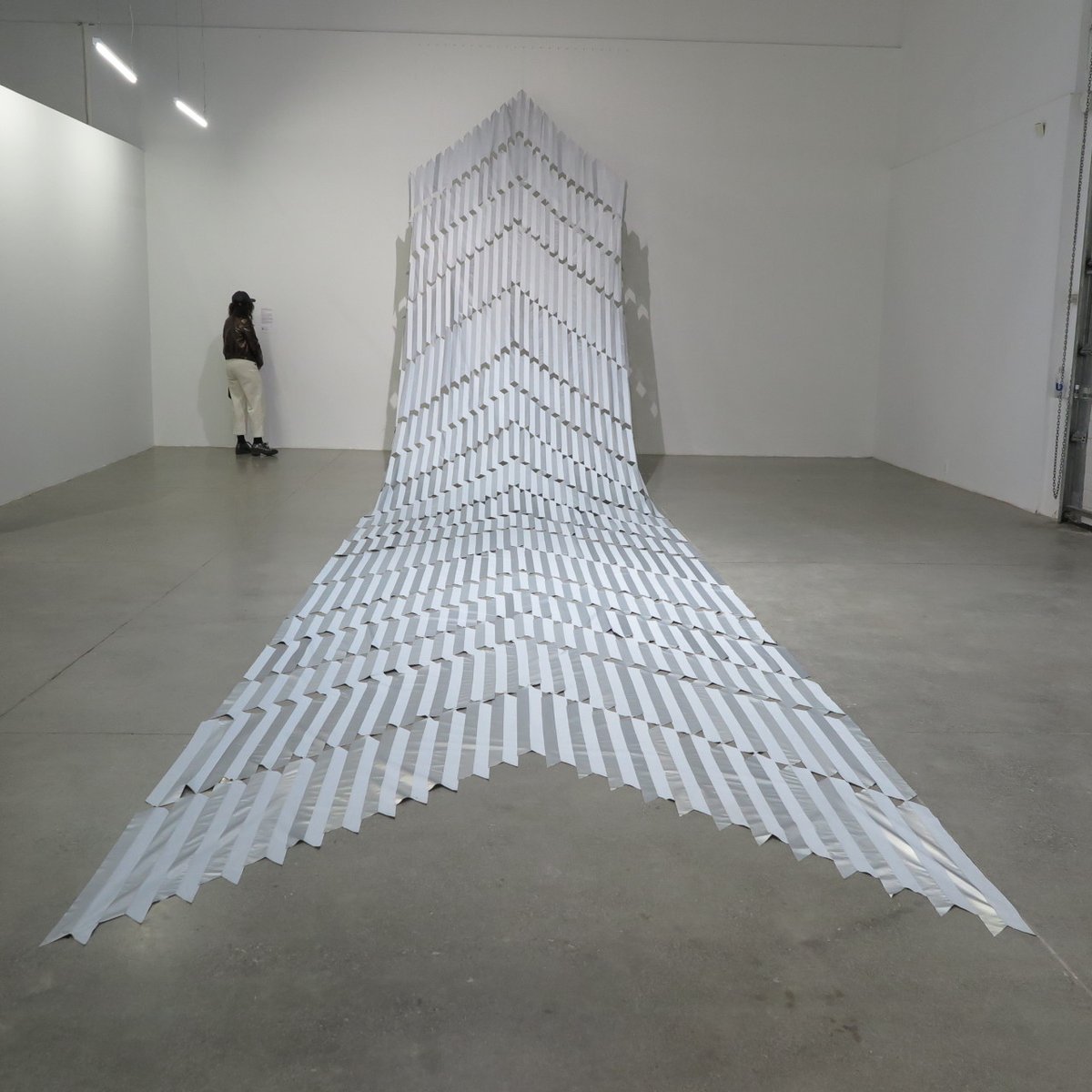 Arsenal Contemporary Art: Reflective fabric 40 metres long, stitched by @MataAhoCollective (2014) Kaokao #1, part of @TorontoBiennial. Pieced together by Maori artists, in a tukutuku chevron design used both as a military symbol and birthing… bit.ly/3ytKofU [tumblr]