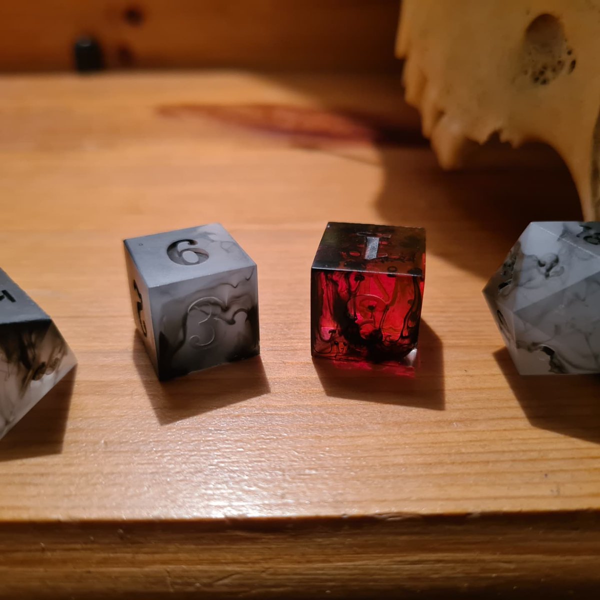 NojCosplay's tweet photo. @Artyfakes My friend @writelikeashark is making dice. These are a few of his. https://t.co/Z86ol3ptI1
