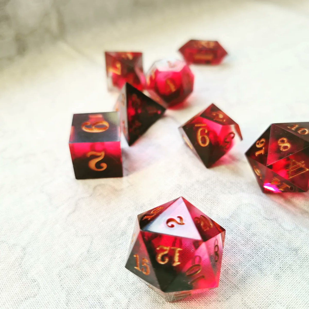 NojCosplay's tweet photo. @Artyfakes My friend @writelikeashark is making dice. These are a few of his. https://t.co/Z86ol3ptI1