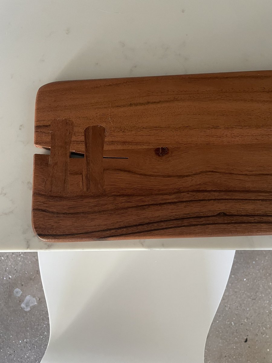 Katie_Altman's tweet photo. @CrateandBarrel shipped me a cheese board with one of the shoddiest repair jobs I’ve ever laid my eyes on… https://t.co/oe6VGkCFkI