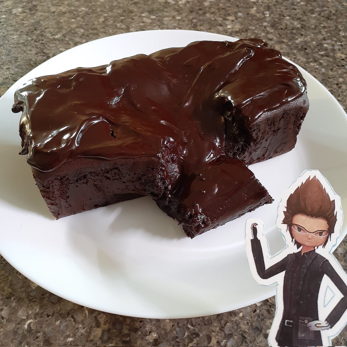 FinalKingdomXV's tweet photo. Cooking Tree's chocolate fudge cake. May have put the topping on before the cake fully cooled...oh well it's now a lava cake #nofilter #BakingAssistantPocketIgnis #chocolatefudgecake https://t.co/IyUYVOUFns