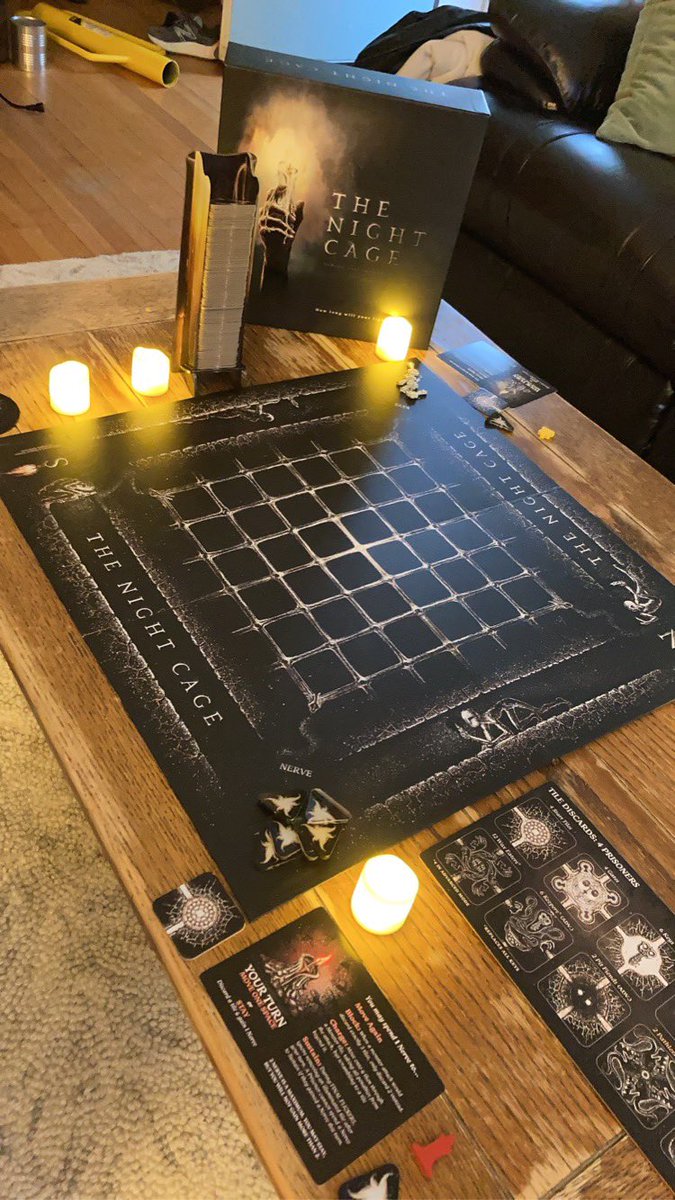 TokenGaymer's tweet photo. I feel like the candles really add to the ambiance of the Night Cage. Happy to report we made it out safe! #thenightcage #smirkanddagger #smirkanddaggergames #bgg #boardgame #coopgame #tabletopgame #games #tilegame #horrorgame https://t.co/3oI5SnOAv4