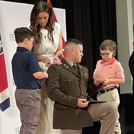 SkyhawkAggie's tweet photo. Best Photo of this Graduation Weekend: @UTMArmyROTC cadet AJ Maxwell having his sons pin on his 2nd Lieutenant bars during his commissioning ceremony.  AJ also received a B.S. in Agricultural Engineering Technology. He already works for @lismith_inc &amp; serves in @TNNationalGuard. https://t.co/J5kDtcTSJV