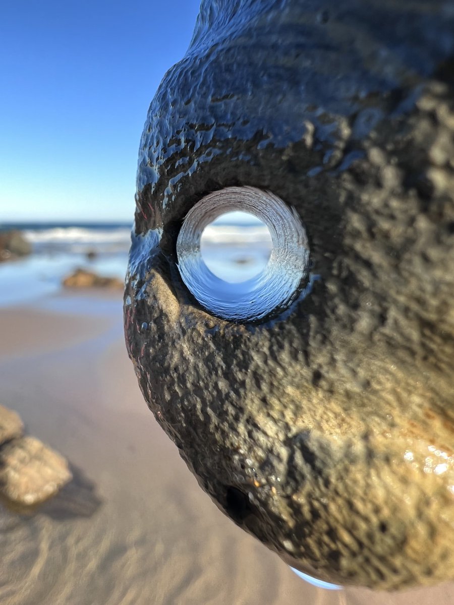 Found a rock with a natural hole while walking along the beach. #beach #rockformation #naturesart