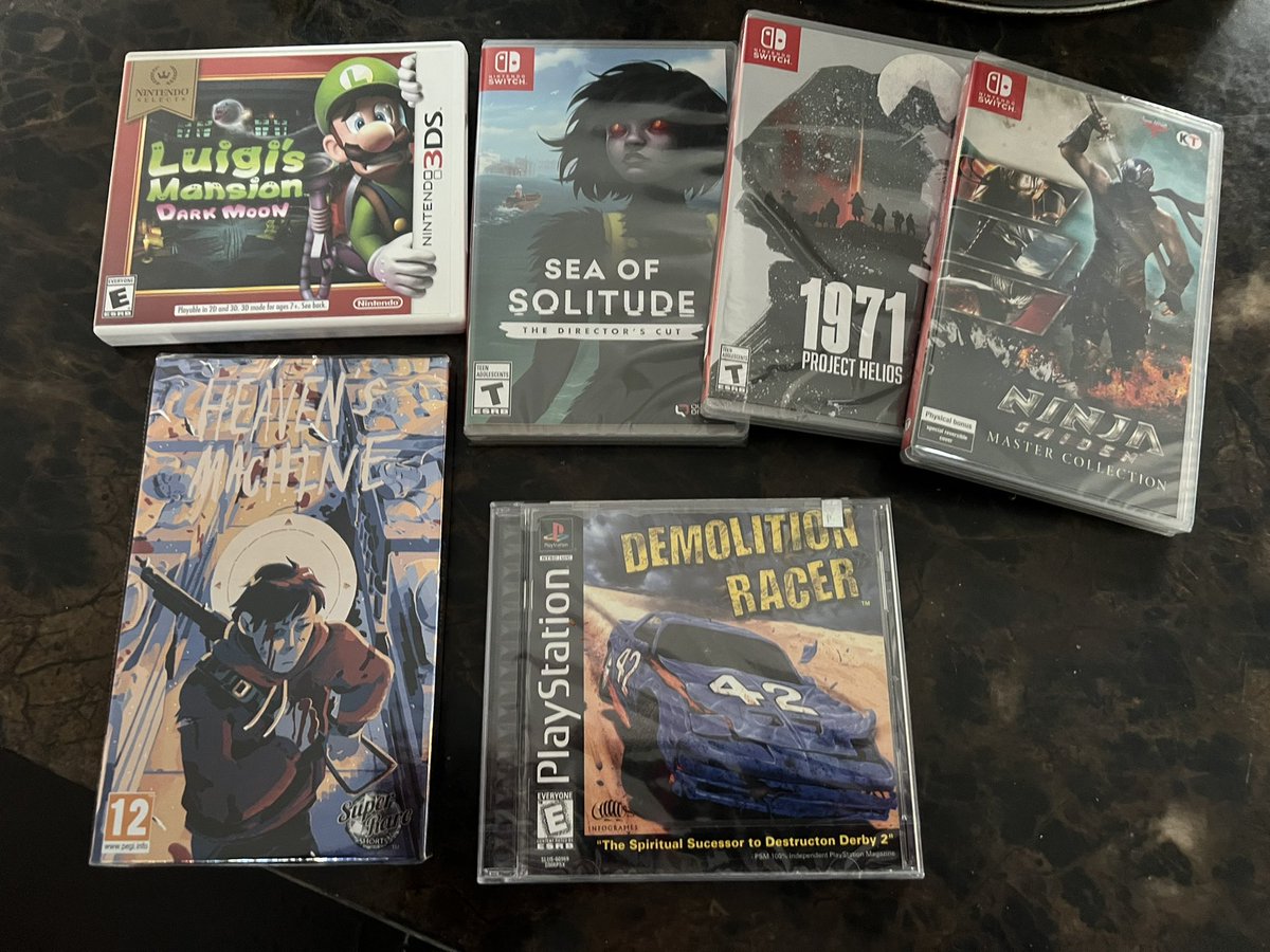 Some great #pickups today at a local group sale. 
 Sealed PS1 copy of Demolition Racer!! Yea please. And some lovely #NintendoSwitch goodness 😃