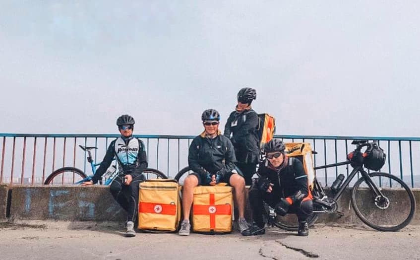 'Pedal power! In Mykolaiv, more than 20 #volunteers with the @RedCrossUkraine hop on bikes to deliver aid to large families and people with disabilities. They cover 800+ kilometres/day, delivering more than 100 food kits. The power of kindness in motion. #BeHumanKind