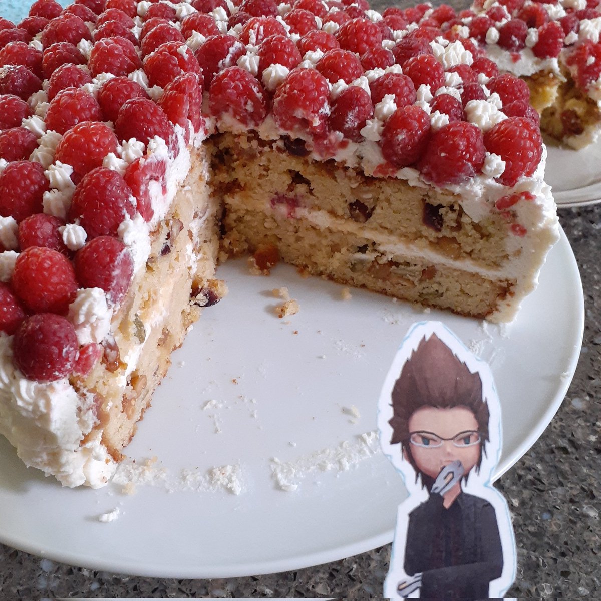 FinalKingdomXV's tweet photo. Gluten free almond cake. Decorated with stabilized whip cream and raspberries. Interior of the cake has cranberries, raisins, sunflower seeds &amp; peanuts. Top layer was actually broken but I magicked it back together. Happy Mother's day! #nofilter #BakingAssistantPocketIgnis https://t.co/r7XtOmK2uO